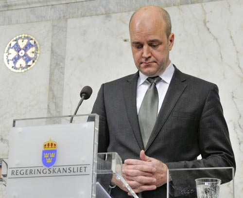 Swedish Prime Minister Fredrik Reinfeldt gives a news conference regarding Saturday&apos;s two bomb blasts in Stockholm December 12, 2010. [China Daily/Agencies] 