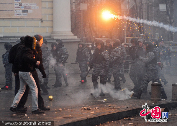 Police clash with protesters who have gathered in central Moscow&apos;s Manege Square to remember a Spartak fan, Yegor Sviridov, killed a few days earlier in Moscow by several men from Russia&apos;s Caucasus region. [CFP]