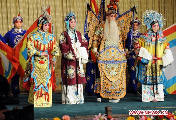 Award-winning fans of the Peking Opera perform in Beijing, capital of China, Dec. 11, 2010. Fans gathered together during a celebration in Beijing Saturday as Peking Opera was recognized as an intangible cultural heritage in November by the United Nations Educational, Scientific, and Cultural Organization (UNESCO). 