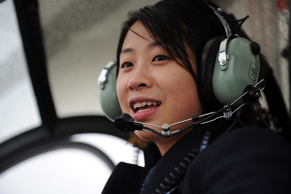 Su Shan, who is among the country&apos;s first three women helicopter pilots, prepares to fly a Schwarzer 300CBI chopper on Sunday in Hefei, capital of East China&apos;s Anhui province, Dec 13, 2010. [Xinhua] 