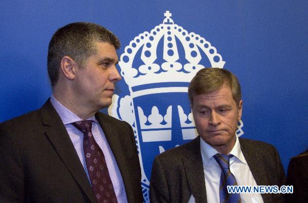 Swedish Chief Prosecutor Tomas Lindstrand (R) and Security Police official Anders Thornberg (L) attend a news conference in Stockholm, Sweden, Dec. 13, 2010. [Wu Ping/Xinhua]