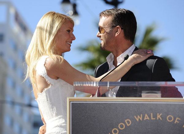 Gwyneth Paltrow (L) hugs singer Tim McGraw at a ceremony where Paltrow received a star on the Hollywood Walk of Fame in Los Angeles December 13, 2010.