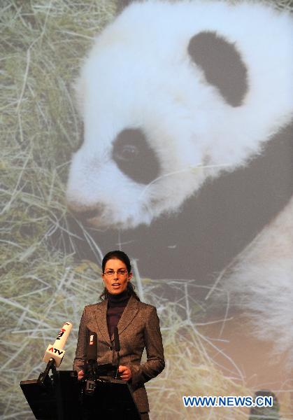 Eveline Dungl, zookeeper of the pandas, speaks during a panda name-giving ceremony held in Zoo Vienna in Vienna, capital of Austria, Dec. 13, 2010. Zoo Vienna held a name-giving ceremony for a male panda who was born on Aug. 23 this year. The panda was named 'Fu Hu', meaning happy tiger. 'Fu Hu' was the second panda born in Zoo Vienna, while its brother 'Fu Long' was born here in August, 2007.