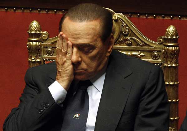 Italian Prime Minister Silvio Berlusconi attends a session at the Senate in Rome December 14, 2010. [Xinhua] 