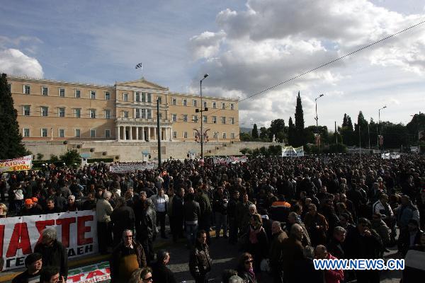 Greek demonstrators attend a rally in Athens, capital of Greece, Dec. 14, 2010. [Marios Lolos/Xinhua]