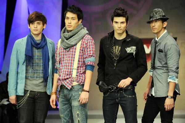 Models present creations during the Levi's 2011 spring collection show in Taipei, southeast China's Taiwan, Dec. 15, 2010.