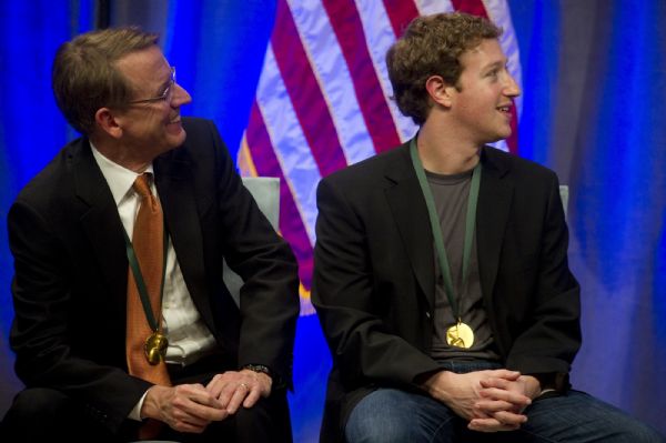 Venture capitalist John Doerr (L) and Facebook founder Mark Zuckerberg attend the California Hall of Fame induction ceremony in Sacramento California, December 14, 2010. 