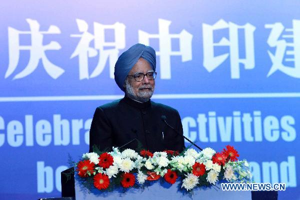 Indian Prime Minister Manmohan Singh addresses the celebration activities of the 60th anniversary of the Establishment of Diplomatic Relations between China and India, in New Delhi, India, Dec. 16, 2010. [Liu Weibing/Xinhua]