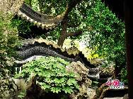 Yuyuan Garden,simply called 'Yu Garden,' is the largest of Shanghai's ancient gardens with architectural styles of the Ming and Qing Dynasties. The garden has six areas, each with its own style. The Grand Rockery, in the center of the Garden, is the most renowned sight here. [Photo by Jia Yunlong]
