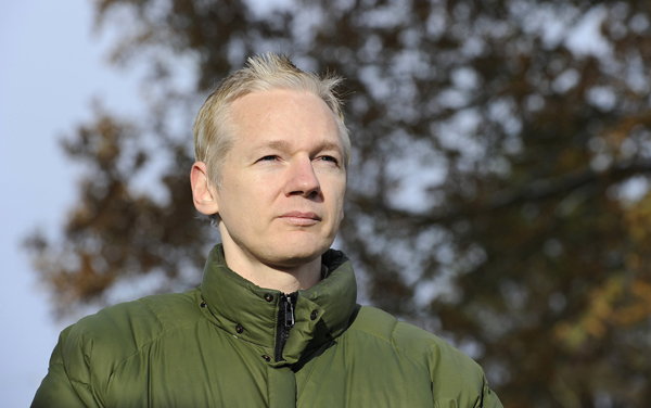 WikiLeaks founder Julian Assange speaks to the media outside Ellingham Hall, the home of his friend, journalist Vaughan Smith, in Norfolk, England December 17, 2010. Assange said on Friday that he was the target of an aggressive U.S. investigation and feared extradition to the United States was &apos;increasingly likely&apos;. [Xinhua]