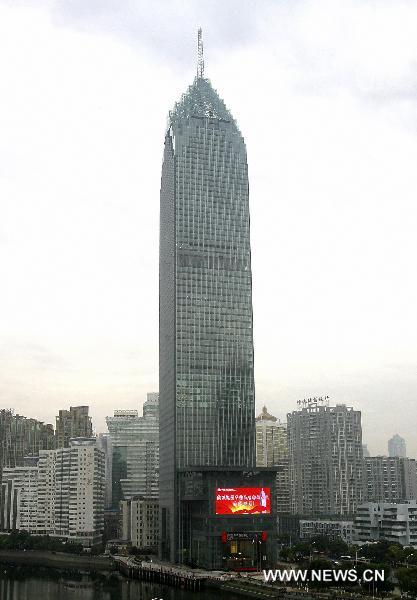 Photo taken on Dec. 18, 2010 shows a 68-storey building of China Minsheng Bank in Wuhan, capital of central China&apos;s Hubei Province. The 325-meter skyscraper, the tallest building in Wuhan, was put into use Saturday. [Xinhua]