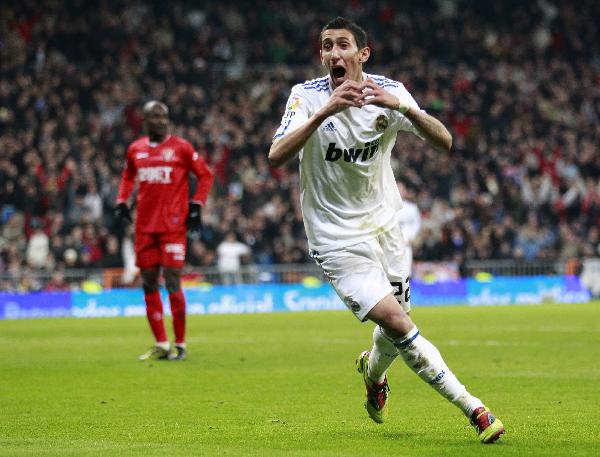 Real Madrid's Angel Di Maria celebrates his goal against Sevilla during their Spanish first division soccer match at Santiago Bernabeu stadium in Madrid December 19, 2010. Real Madrid wins 1-0.(Xinhua/Reuters Photo)