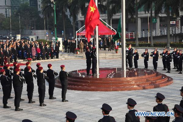 The flag-raising ceremony marking the 11th anniversary of Macao&apos;s handover is held at the Golden Lotus Square in Macao Special Administrative Region, south China, Dec. 20, 2010. [Xinhua]