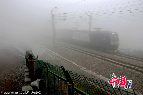 The Yichang-Wanzhou railway, which considered as China&apos;s most difficult and expensive to build started operation on Dec. 22, 2010. The maiden journey was launched at 10: 18 a.m. as a train left Enshi Station of Hubei Province and is expected to reach Yichang City of Hubei in more than two hours. [CFP]