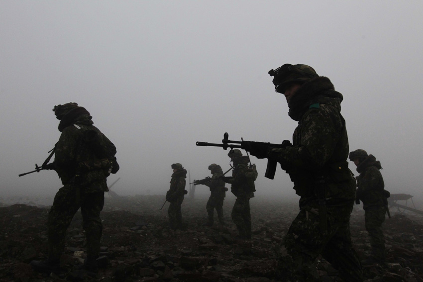 In this Tuesday, Dec. 21, 2010 image, South Korean Army soldiers patrol near the seaside in Dangjin, south of Seoul, South Korea.