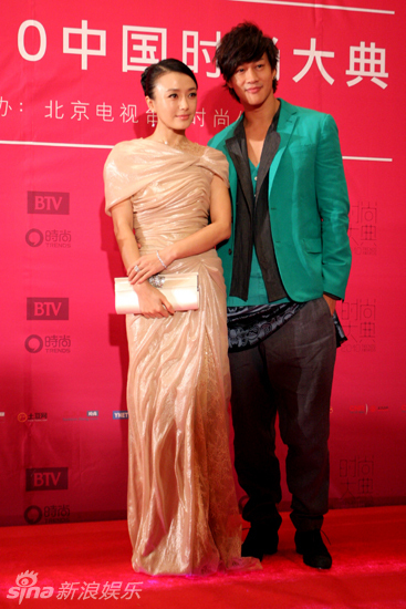 Actress Qin Lan (L) and actor Peter Ho (R).