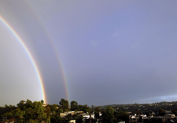 Double rainbow seen during heavy rain in LA