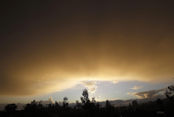 Double rainbow seen during heavy rain in LA