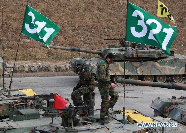 South Korean soldiers take part in a military drill in Pocheon, South Korea, on Dec. 23, 2010. [Park Jin Hee/Xinhua]