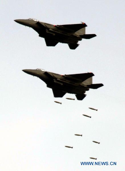 Military aircrafts are seen during a military drill in Pocheon, South Korea, on Dec. 23, 2010. [Pool/Xinhua]