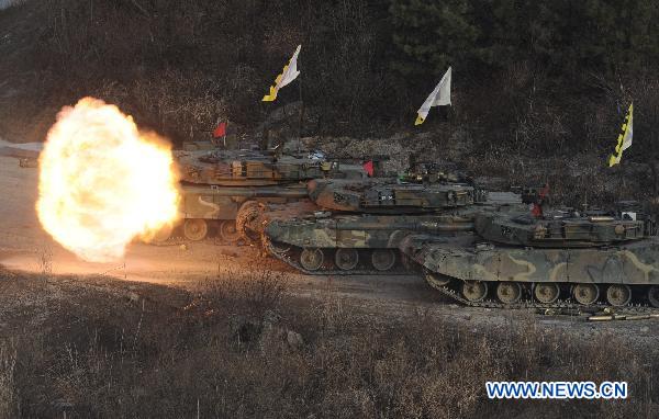 Tanks take part in a military drill in Pocheon, South Korea, on Dec. 23, 2010. [Pool/Xinhua]