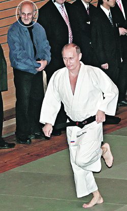 Russian Prime Minister Vladimir Putin and his long-time judo coach Anatoly Rakhlin (Left)