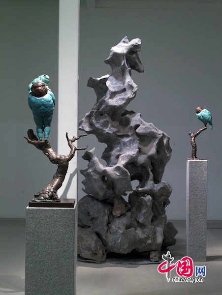 Qu Guangci's works. He explains his understanding of the relationship between nature and human being with 16 pieces of sculptures. The exhibition will last till January 17, 2011.