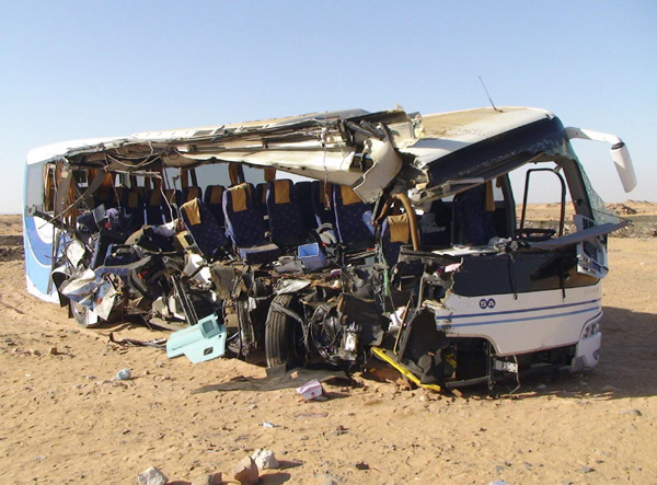 A tour bus slammed into a truck in southern Egypt on Sunday, killing eight Americans and injuring 21 others in the latest fatal crash involving tourists.[China Daily/Agencies] 