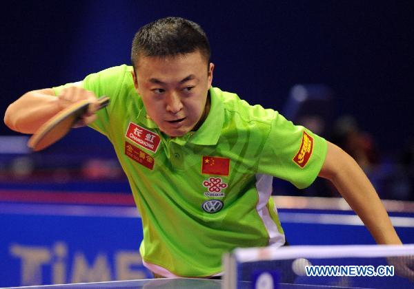 Ma Lin of China returns the ball to Soumyajt Ghosh of India during the men's singles first round match at the 2010 China Open table tennis tournament in Suzhou, a city of east China's Jiangsu Province, on Aug. 19, 2010. (Xinhua/Yang Lei)