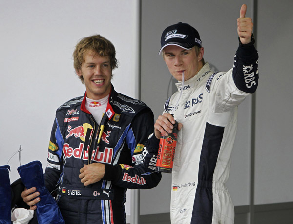 Sebastian Vettel (L). (Xinhua/Reuters File Photo) 
