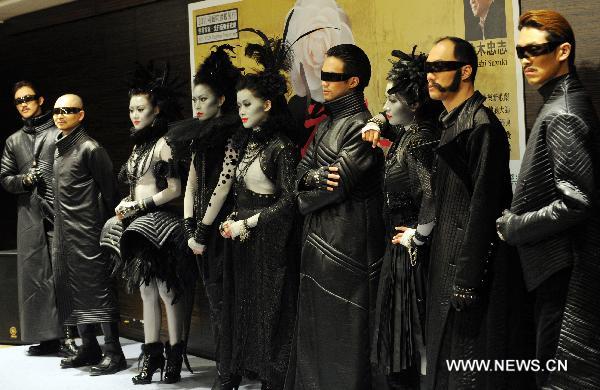 Models present designed costumes for an avant-garde musical 'The Lady of the Camellias' in Taipei, southeast China's Taiwan, Dec. 28, 2010. An innovated musical adapted from the classic novel 'The Lady of the Camellias' will be staged in Taipei in 2011 February.