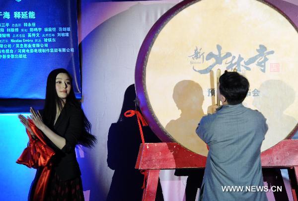 Actress Fan Bingbing (L) and actor Jackie Chan (R) attend a promotion campaign for the movie Shaolin in Beijing, capital of China, Dec. 28, 2010. The movie Shaolin, named after a famous Buddhist monastery in central China's Henan Province, will make its national debut on Jan. 19, 2011.