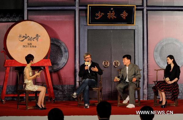 Director Chen Musheng (2nd L), the main actor Jackie Chan (2nd R) and the main actress Fan Bingbing (1st R) attend a promotion campaign for the movie Shaolin in Beijing, capital of China, Dec. 28, 2010. The movie Shaolin, named after a famous Buddhist monastery in central China's Henan Province, will make its national debut on Jan. 19, 2011. 