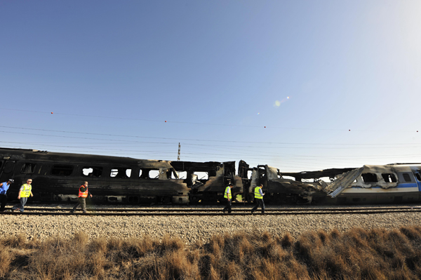 The photo taken on Dec.28, 2010 shows a burnt passenger train near Shefayim, Israel. A fire broke out on a train near the central Israeli town of Shfayim on Tuesday morning, injuring dozens of passengers, local media reported. 