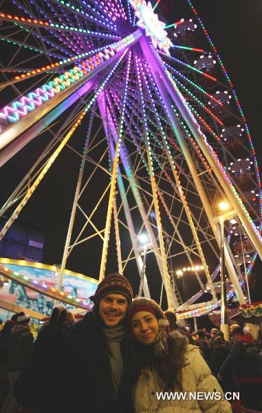 People celebrate the New Year near the Brandenburg Gate in Berlin, Germany, Dec. 31, 2010. 