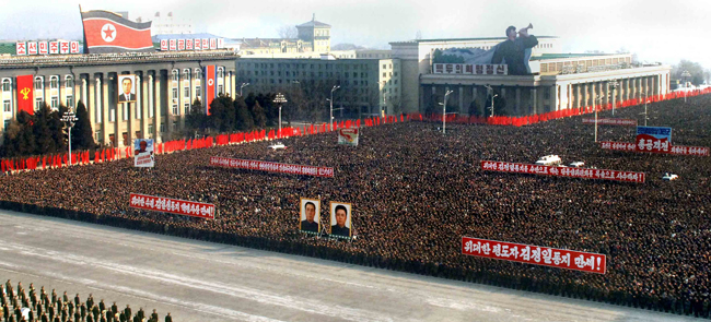 People attend a mass rally on the Kim Il-sung square in Pyongyang Jan 3, 2011. [Xinhua]