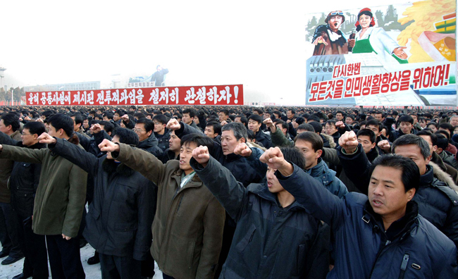 People attend a mass rally in Pyongyang Jan 3, 2011. [Xinhua]