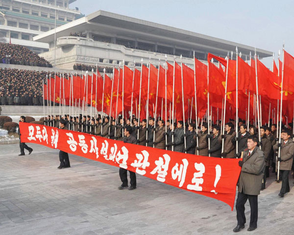 People attend a mass rally in Pyongyang Jan 3, 2011. [China Daily/Agencies]