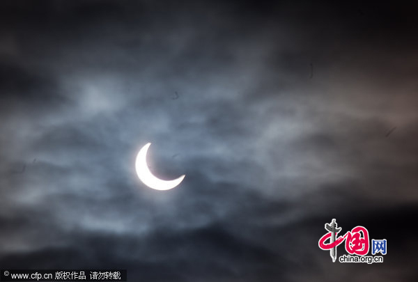 Photo taken on Jan. 4, 2011, shows a partial solar eclipse in Moscow, capital of Russia. [CFP]