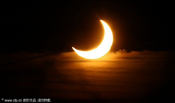 Photo taken on Jan. 4, 2011, shows a partial solar eclipse in Moscow, capital of Russia. [CFP]