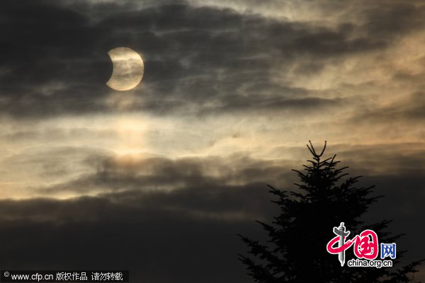 Photo taken on Jan. 4, 2011, shows a partial solar eclipse in Germany. [CFP]