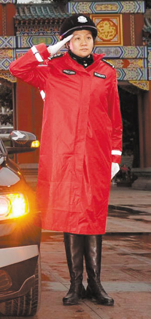 A women officer in red. 