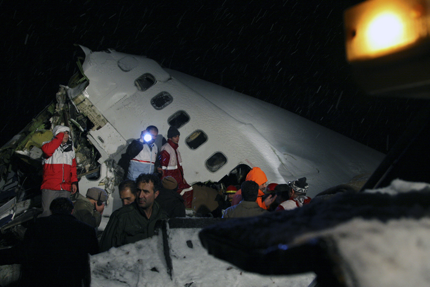 Rescuers work at the crash site of a passenger plane near the city of Uroumieh in northwest of Iran on Jan. 9, 2011. [Xinhua]