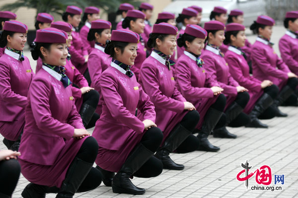 Stewards of Chongqing High-speed train have a training befor mount guard on January 8, 2011 in Chongqing, China. [CFP]