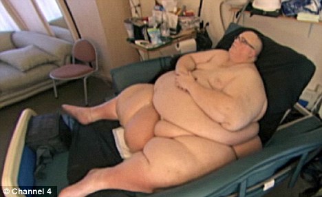 Fattest man: Paul Mason received a vital operation after ballooning to nearly 70 stone but plans to sue the NHS for ignoring his pleas for help