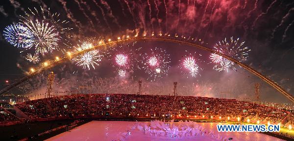 Fireworks explode during the opening ceremony of the 2011 Asian Cup football tournament at Khalifa Stadium in Doha, capital of Qatar, Jan. 7, 2011. (Xinhua/Chen Shaojin)