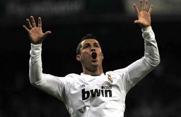 Real Madrid's Cristiano Ronaldo celebrates his goal against Villarreal during their Spanish first division soccer league match at the Santiago Bernabeu stadium in Madrid January 9, 2011. (Xinhua/Reuters Photo)