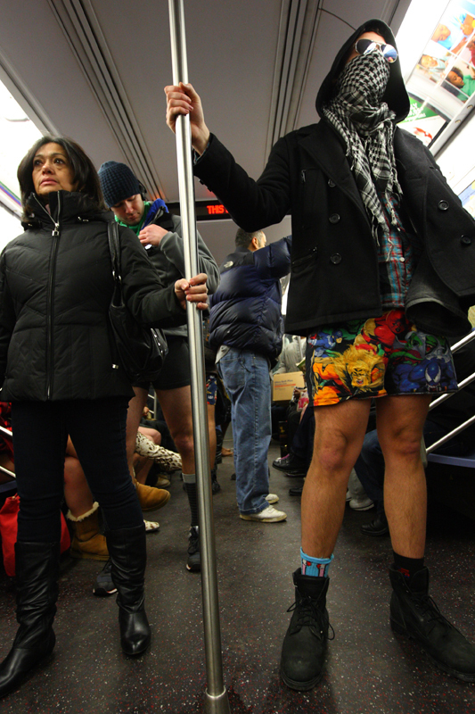 People taking part in the 10th Annual No Pants Subway Ride in New York City January 9, 2011. The New York event, organised by Improv Everywhere, involves participants who strip down to their underwear as they go about their normal routine. [Xinhua]