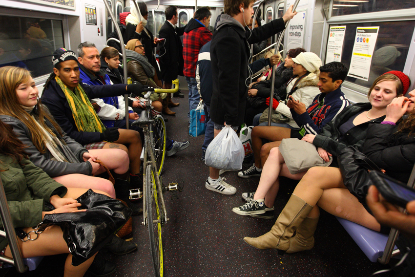 People taking part in the 10th Annual No Pants Subway Ride in New York City January 9, 2011. The New York event, organised by Improv Everywhere, involves participants who strip down to their underwear as they go about their normal routine. [Xinhua]