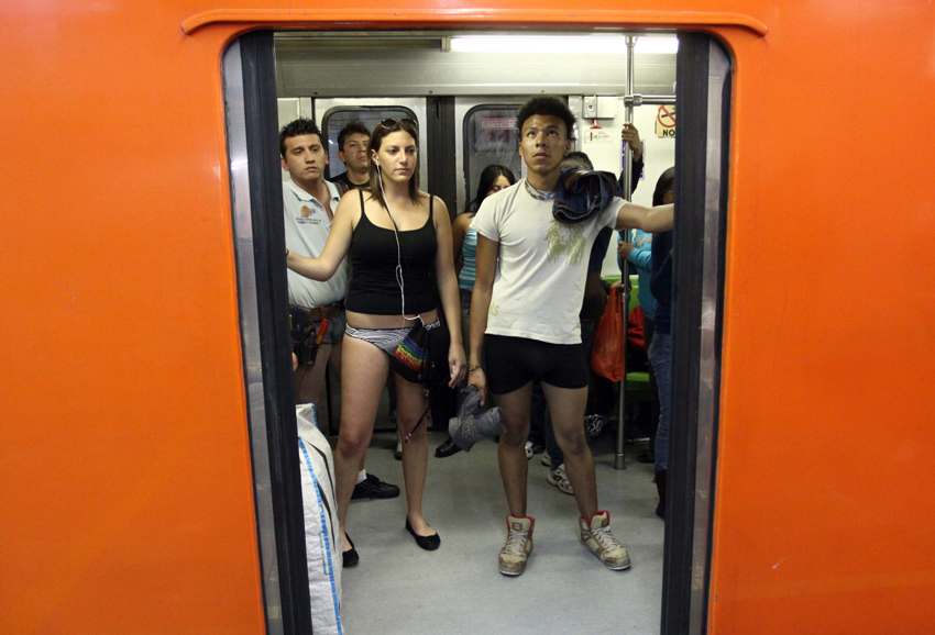 People taking part in the 10th Annual No Pants Subway Ride in New York City January 9, 2011. The New York event, organised by Improv Everywhere, involves participants who strip down to their underwear as they go about their normal routine. [Xinhua]